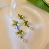 Hivava  -  New Design Lily of The Valley Pearl Green Ear Hook for Women Fashion Elegant White Flowers Drop Earrings Wedding Party Jewelry