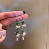 Hivava  -  New Design Lily of The Valley Pearl Green Ear Hook for Women Fashion Elegant White Flowers Drop Earrings Wedding Party Jewelry