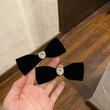 Hivava  -  Elegant Black Velvet Camellia Hair Clip Rhinestone Bowknot Spring Clip Women Korean Hair Styling Barrettes Ribbon Bow Hairpins